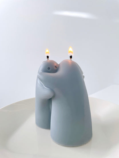 Hugging Couple Candles