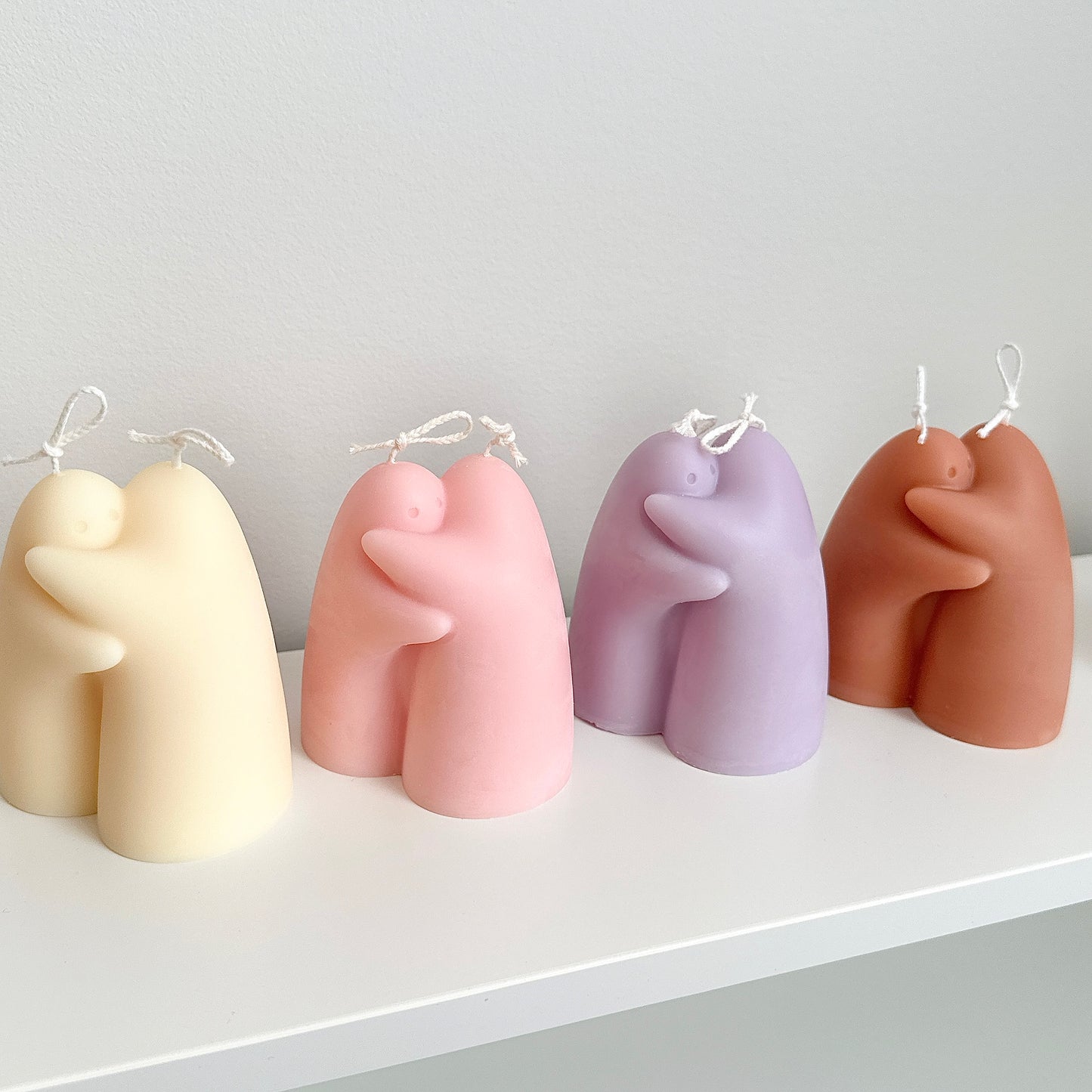 Hugging Couple Candles